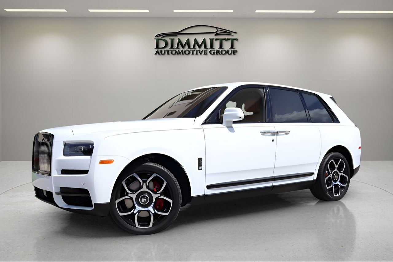 2023 Rolls-Royce Cullinan Black Badge in Arctic White — front three-quarter view