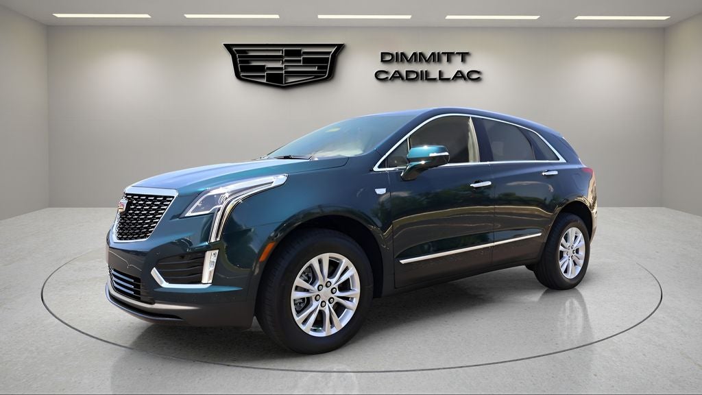 2026 Cadillac XT5 Luxury in Emerald Lake Metallic — front three-quarter view