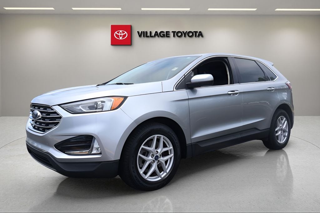2021 Ford Edge SEL in Silver Metallic — front three-quarter view