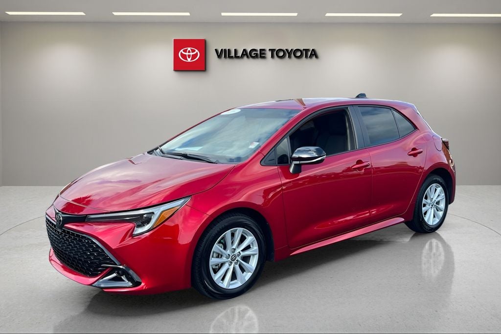 2026 Toyota Corolla Hatchback SE in Red — front three-quarter view