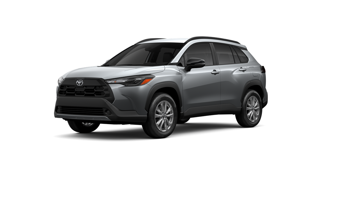 2026 Toyota Corolla Cross LE in Sonic Silver — front three-quarter view