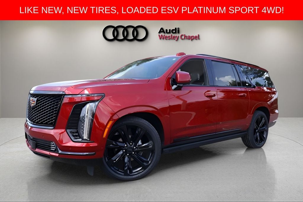 2026 Cadillac Escalade ESV Platinum Edition in Radiant Red Tintcoat — front three-quarter view