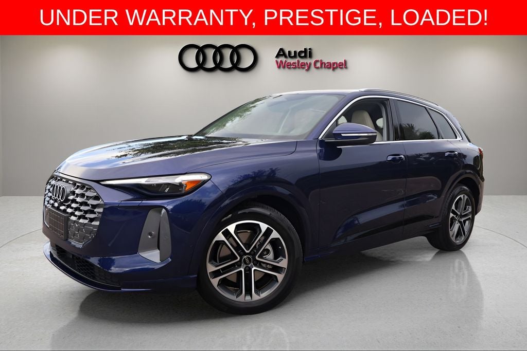 2025 Audi Q5 2.0T Prestige quattro in Navarra Blue Metallic — front three-quarter view