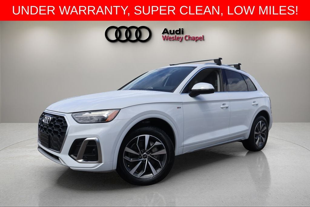 2023 Audi Q5 45 S line Premium Plus quattro in Glacier White Metallic — front three-quarter view