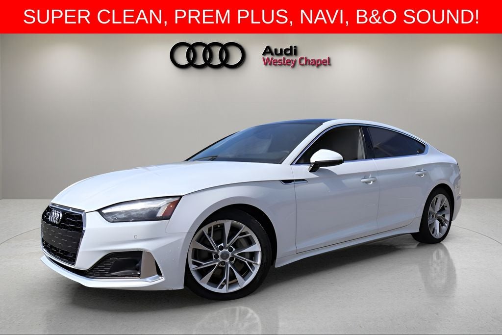 2020 Audi A5 Sportback Premium Plus quattro in Glacier White Metallic — front three-quarter view