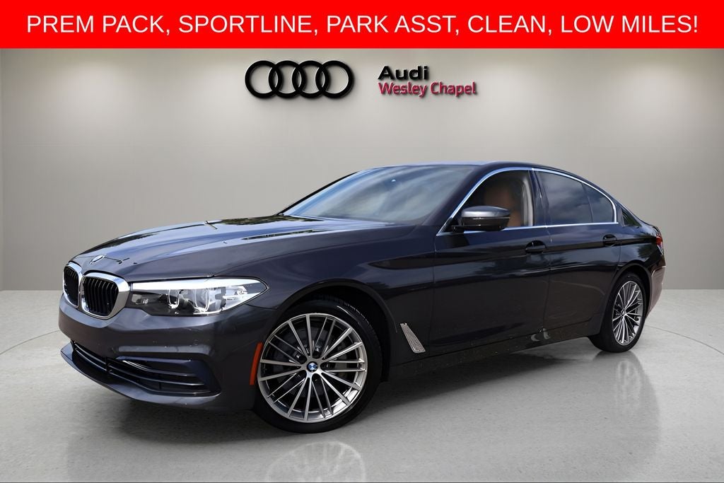 2020 BMW 5 Series 530i xDrive in Dark Graphite Metallic — front three-quarter view