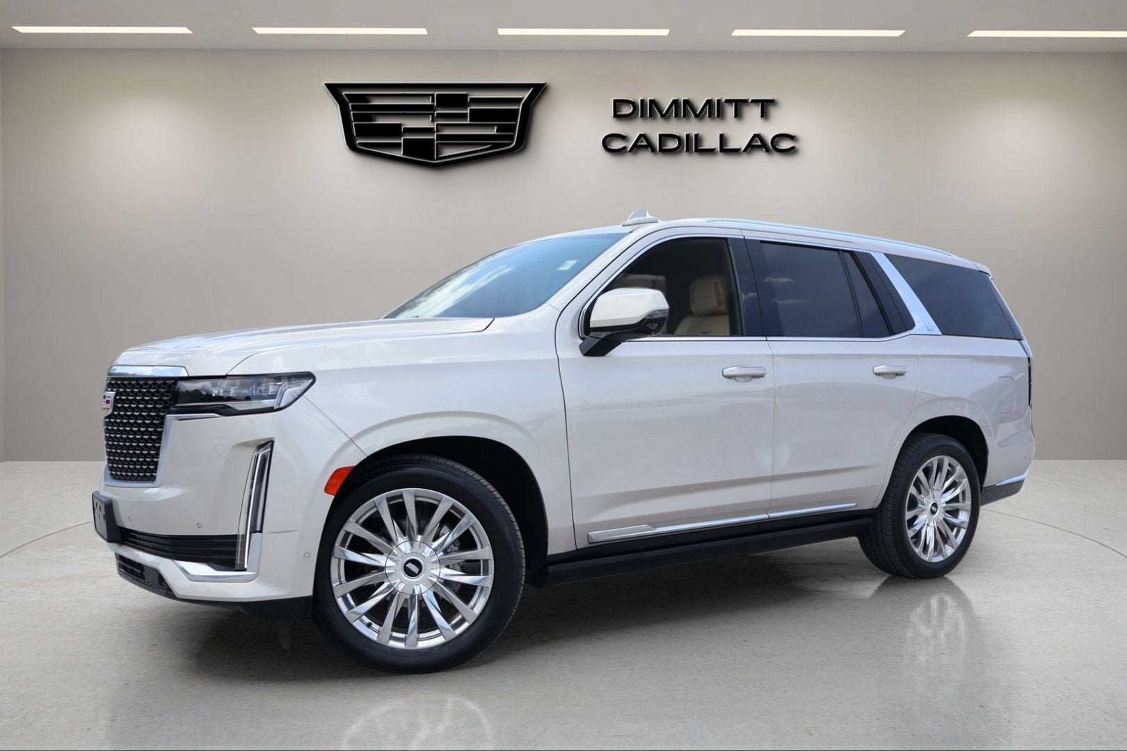 2021 Cadillac Escalade Premium Luxury in Sandstone Metallic — front three-quarter view